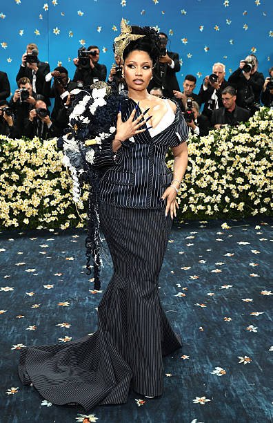 Nicki Minaj at the 2025 Met Gala: A Dandy Pinstripe Vision by Thom Browne 1
