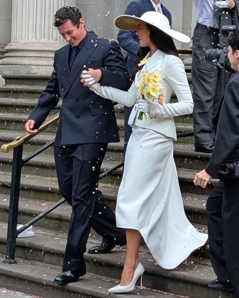 Dua Lipa as a Schiaparelli Bride: The Wedding Skirt Suit That Paid Homage to the Original Cool-Girl Bride 2 Dua Lipa as a Schiaparelli Bride: The Wedding Skirt Suit That Paid Homage to the Original Cool-Girl Bride 1