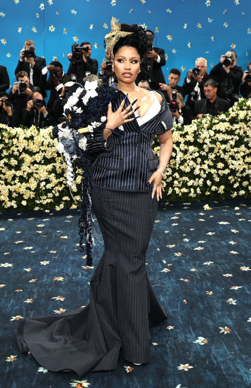 Nicki Minaj at the 2025 Met Gala: A Dandy Pinstripe Vision by Thom Browne