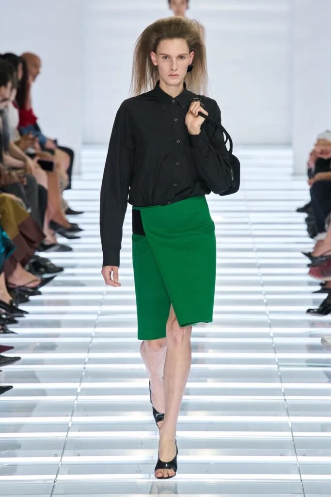 Prada 3 Prada Spring 2027 Ready-to-Wear explores modern silhouettes, sharp tailoring and everyday fashion through Miuccia Prada and Raf Simons’ evolving vision.