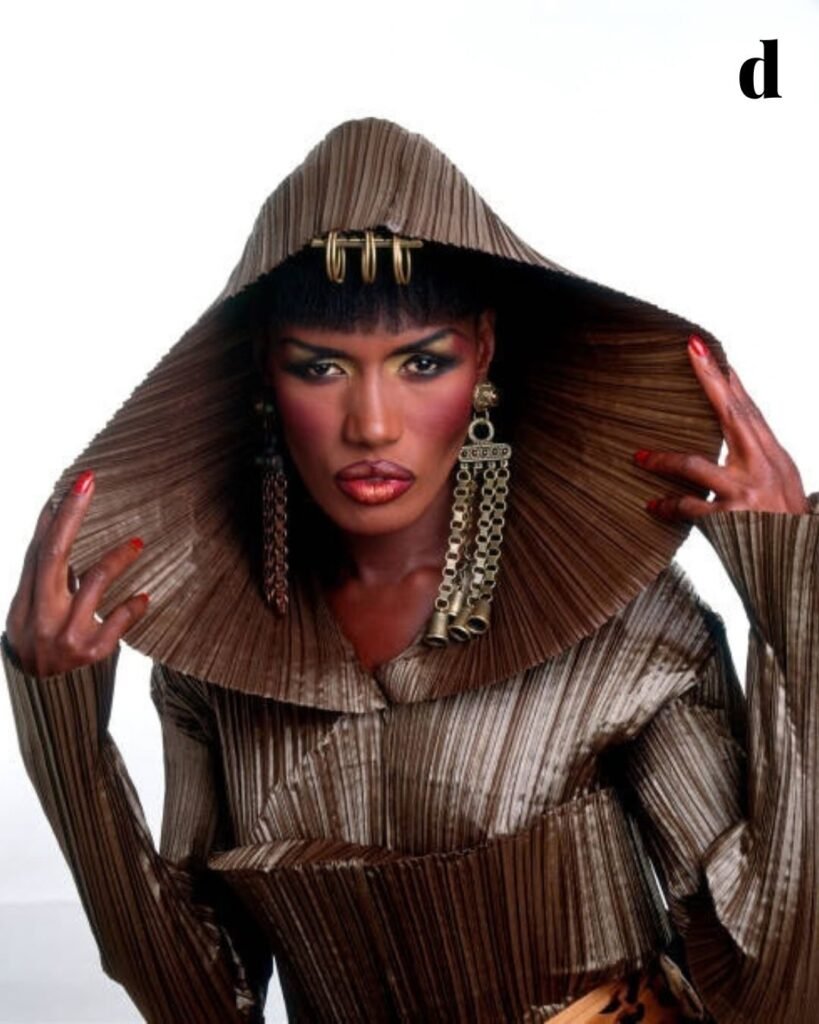 Grace Jones: The Revolutionary Fashion Icon Who Redefined Style, Beauty and Power red minimalist fashion new blog post announcement instagram post 2 1 12