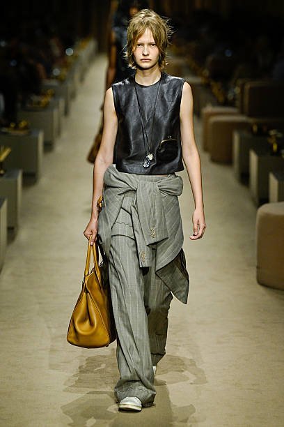 Coach 5e129 a model on the runway at the coach fashion show as a part of rtw spring summer 2027 fashion 1