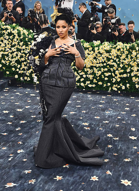 Nicki Minaj IGNITES the 2025 Met Gala in Thom Browne’s Dandy Pinstripe Vision