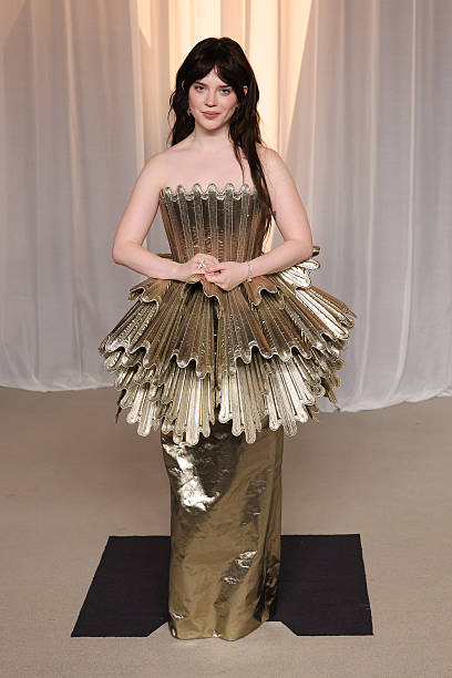Sophie Thatcher Stuns in Sculptural Gold Louis Vuitton at the 6th Annual Academy Museum Gala