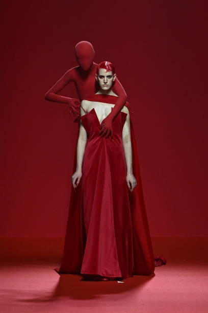 Robert Wun the final red 'appendage' look from Spring/Summer 2024 Couture collection.🪡  