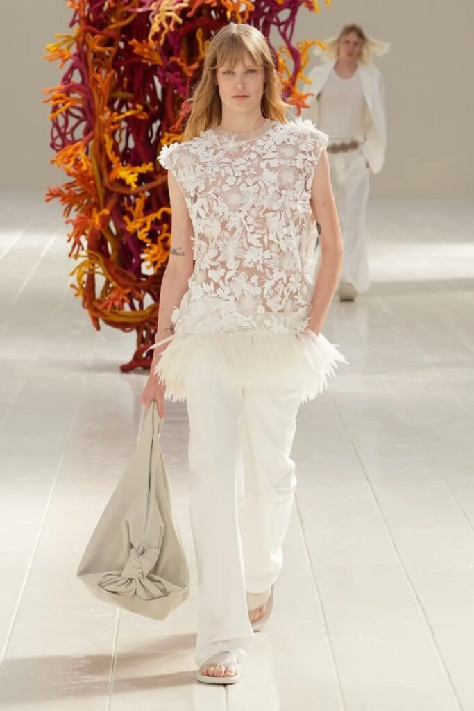 Balenciaga Spring 2027 by Pierpaolo Piccioli explores “unsized” fashion, couture craftsmanship, fluid silhouettes, lightness and freedom through modern dressing.
