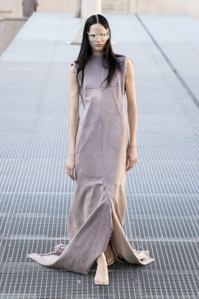 Rick Owens Spring 2027 Ready-to-Wear explores sculptural silhouettes, dark glamour, dramatic proportions and the designer’s futuristic fashion language.