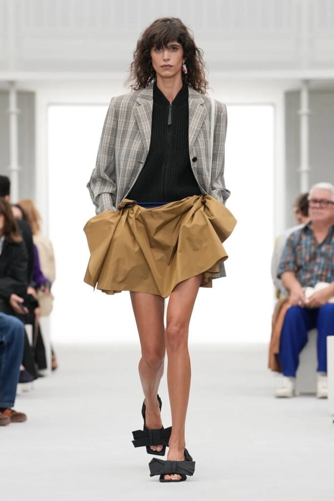 LOEWE 2 LOEWE Spring 2027 Ready-to-Wear by Jack McCollough and Lazaro Hernandez, featuring bold colors, floral prints, micro dresses and sheer layers.